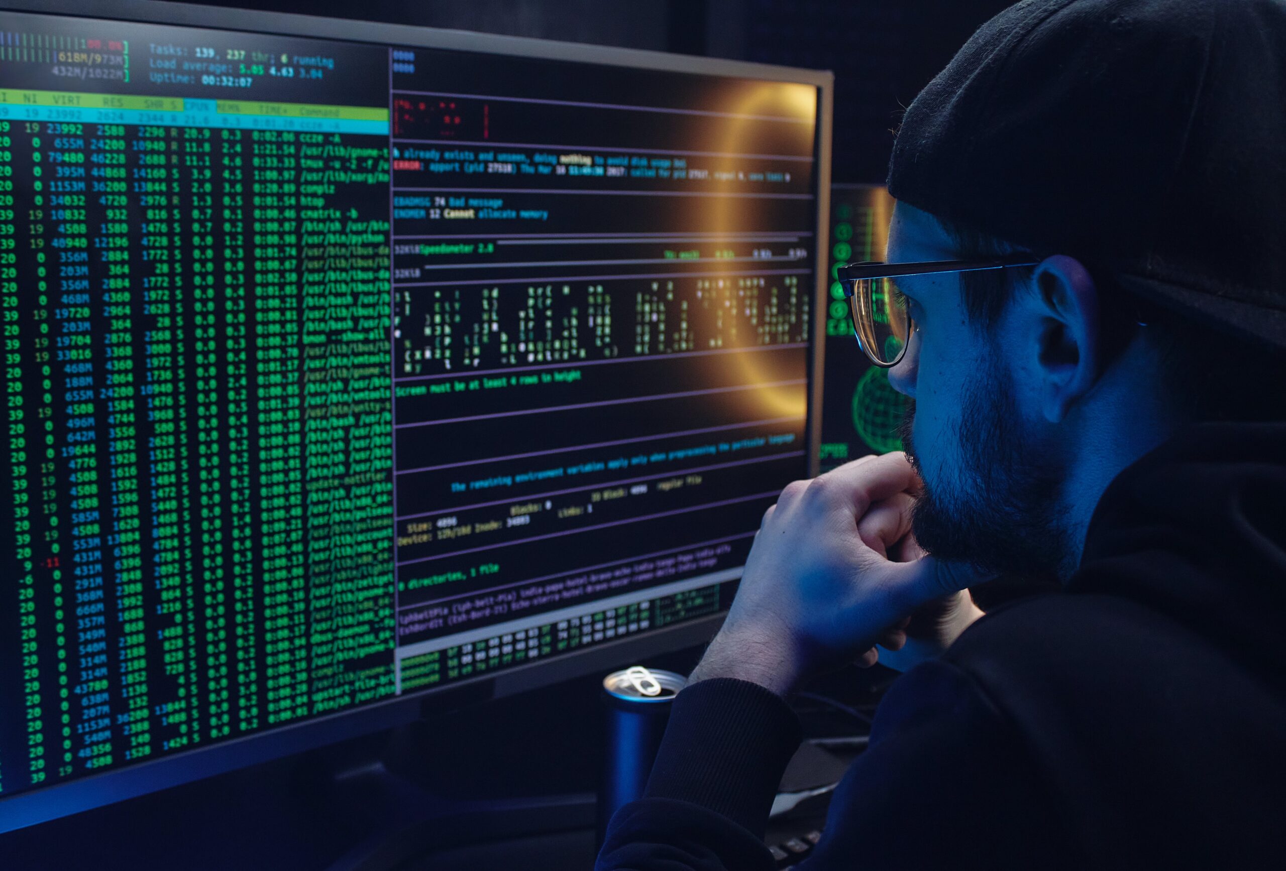 Top-Data-Breaches-of-2023-Numbers-Hit-an-All-Time-High-scaled.jpg Free A Man Looking at a Computer Screen with Data Stock Photo
